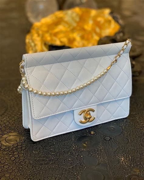 chanel shopping bag pearl|chanel bag with pearl chain.